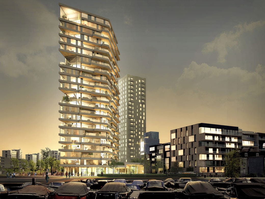In het Amsterdamse Amstelkwartier verrijst het hoogste hout-hybride gebouw van Nederland.