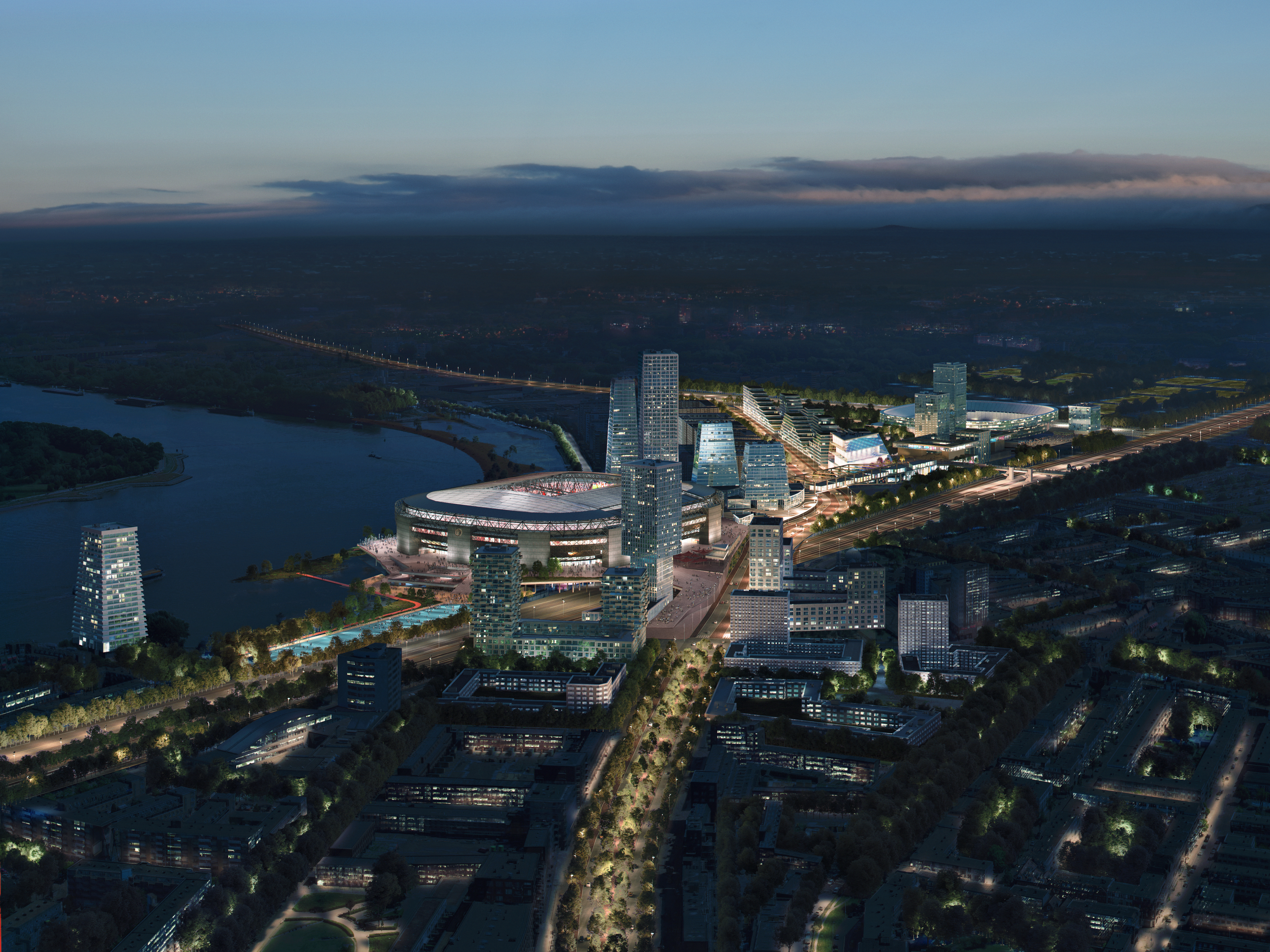 Zicht op Feyenoord City en het nieuwe stadion tijdens een avondwedstrijd. Een goede bereikbaarheid van het gebied is een belangrijk onderdeel geweest van het masterplan ontwerp.  Beeld: OMA/LOLA