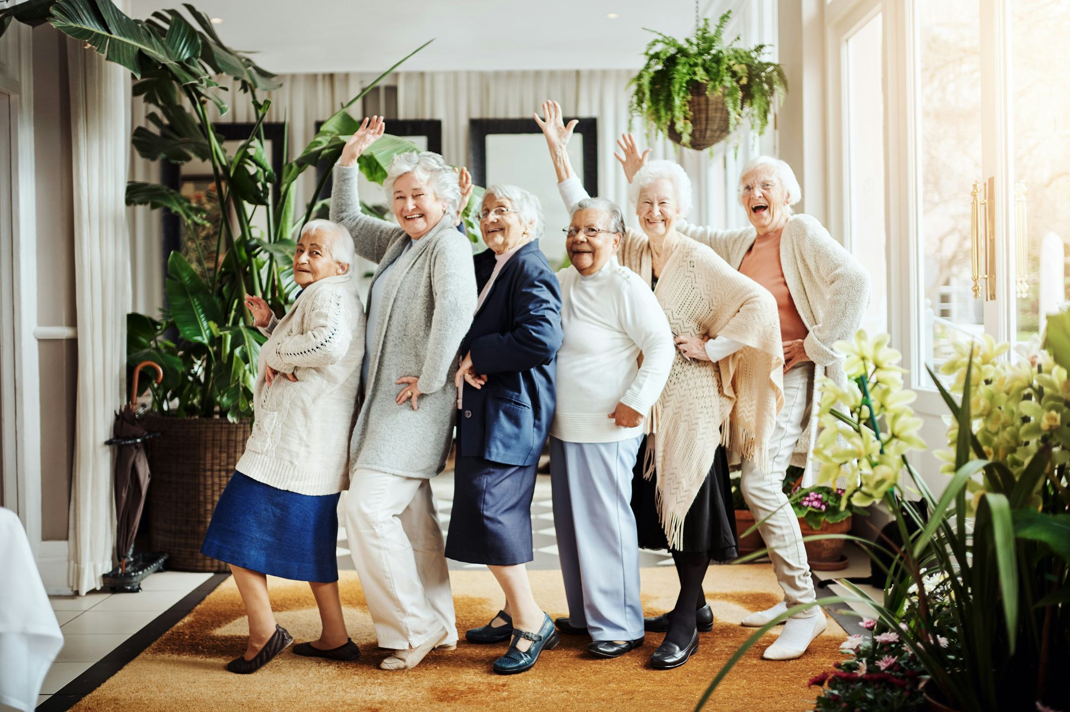 Portrait of a group of happy senior women having fun together at a retirement home